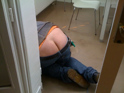 A prime example of Plumber's Bum,. taken froma blog dedicated entirely to documenting the phenomenon of ill-fitting trousers on manually skilled professionals. If you want a good laugh, the blog is well worth a visit!